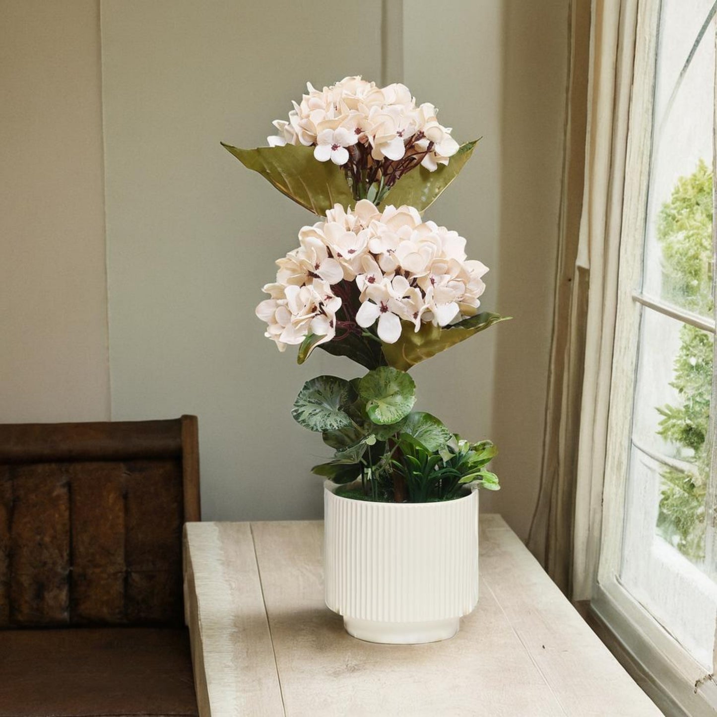 Subtle Serenity: Artificial Beige Hydrangea Arrangement in Ceramic Ribbed Cream Pot