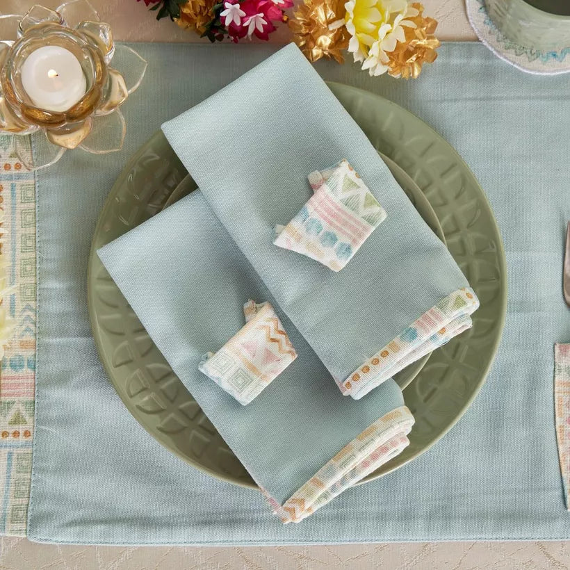 Pastel Geometric 4-Piece Solid Napkin with Printed Flange and Napkin Ring Set