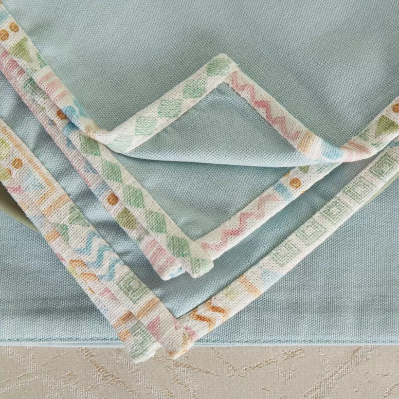 Pastel Geometric 4-Piece Solid Napkin with Printed Flange and Napkin Ring Set