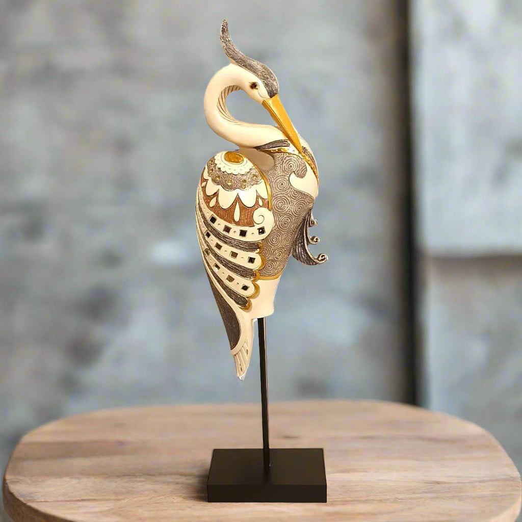 Avian Artistry: Ornate Heron Sculpture on Stand