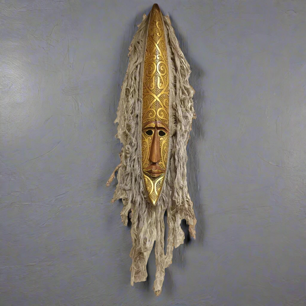 Hand-Carved Tribal Spirit Mask with Ornate Golden Accents