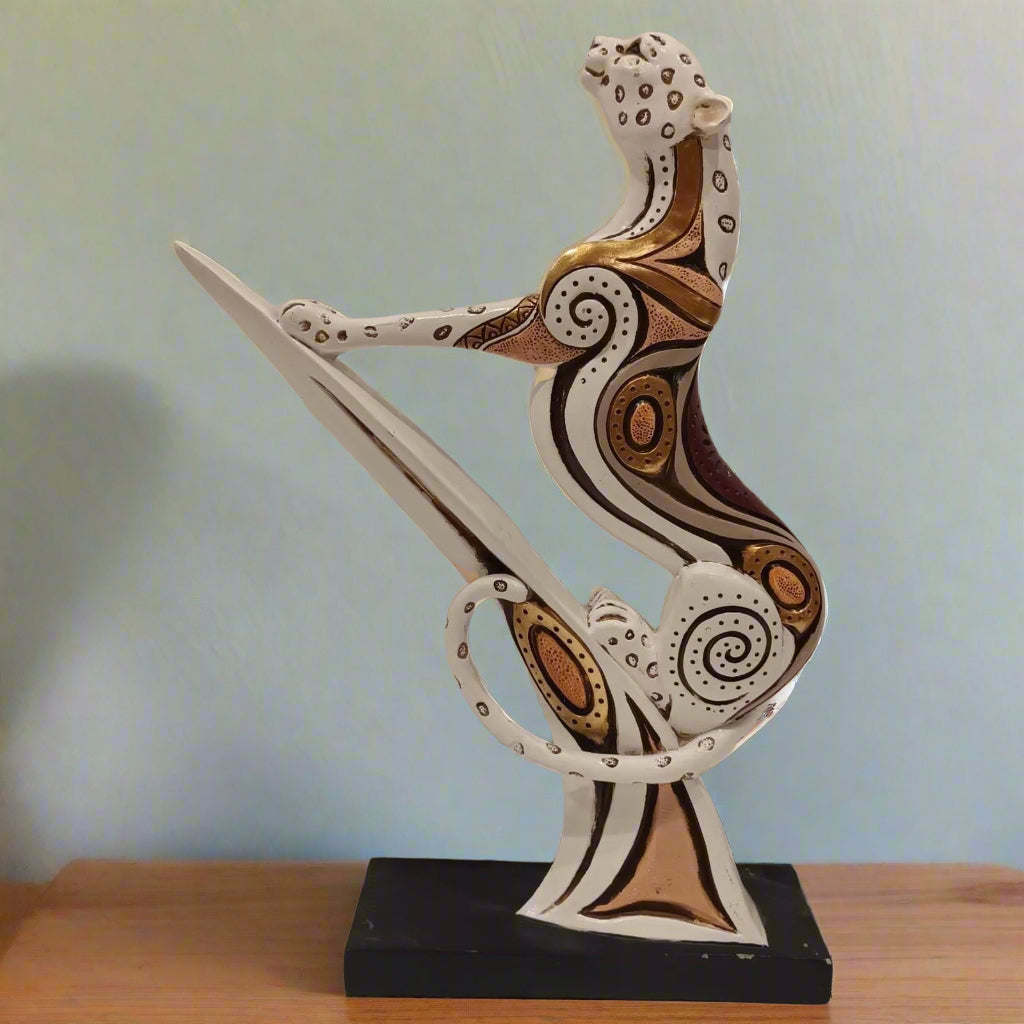 Ascending Grace: Artisan-Decorated Feline Sculpture