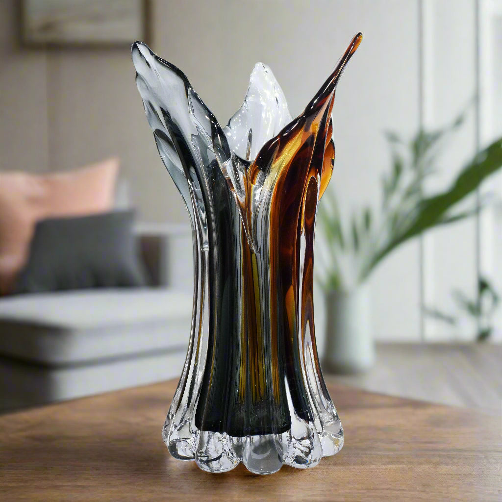 Glass vase with multicolored design on a white background