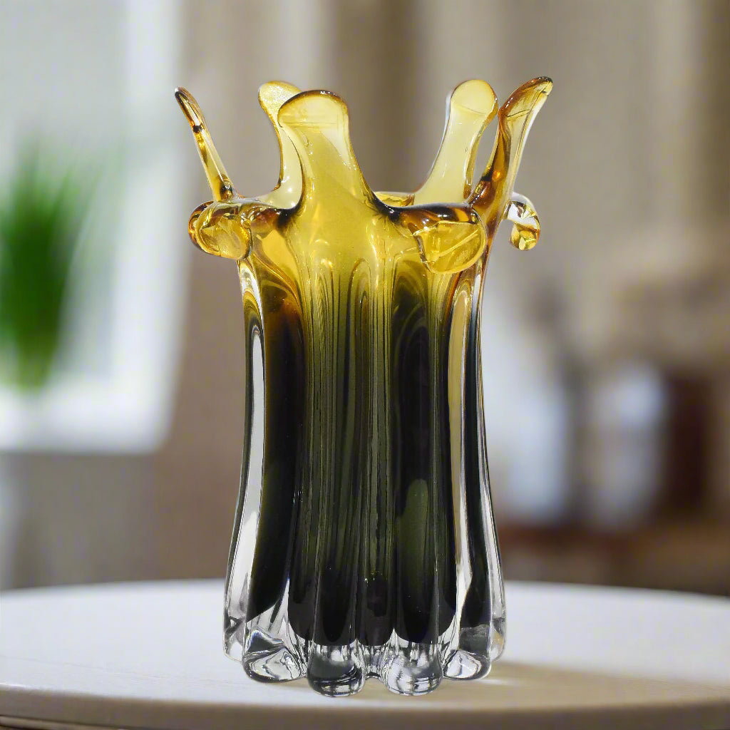 Glass vase with a unique design on a white background