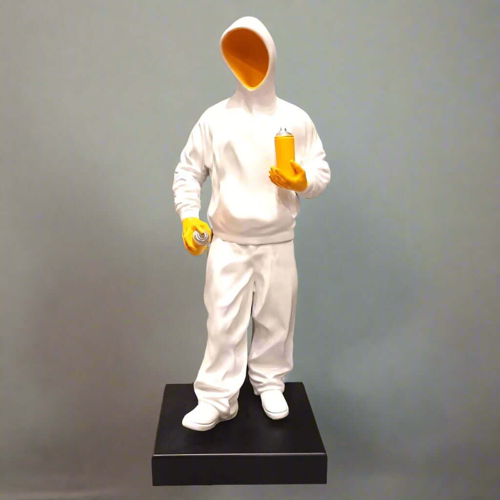 Statue of a person in a white outfit holding yellow objects on a gray background