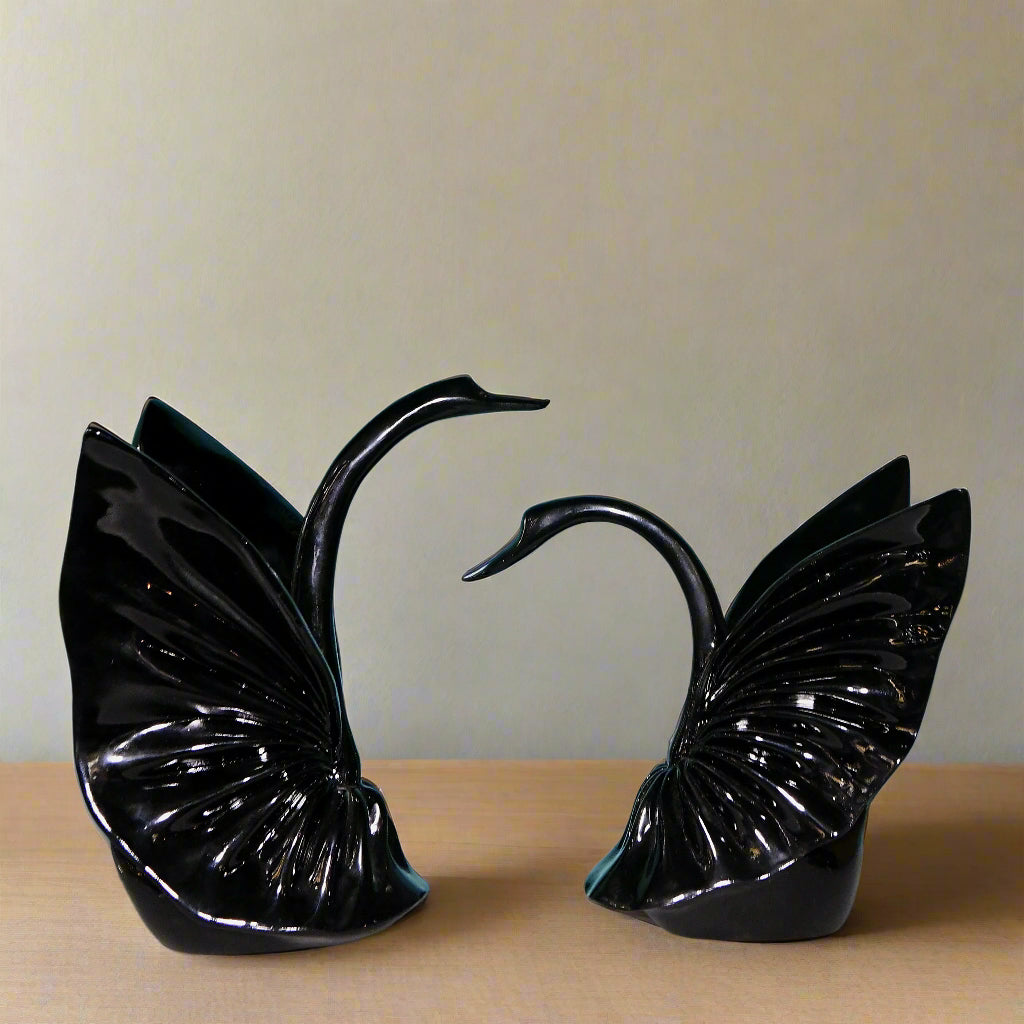 Graceful Embrace: Sculptural Black Swan Pair
