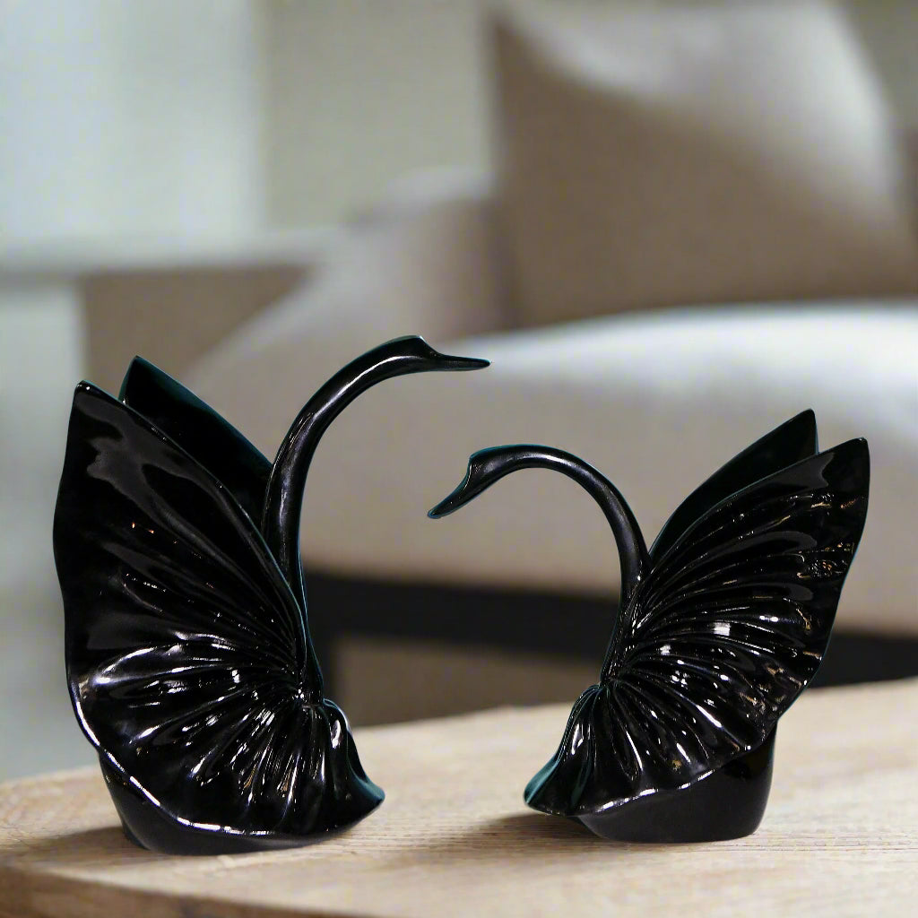 Graceful Embrace: Sculptural Black Swan Pair