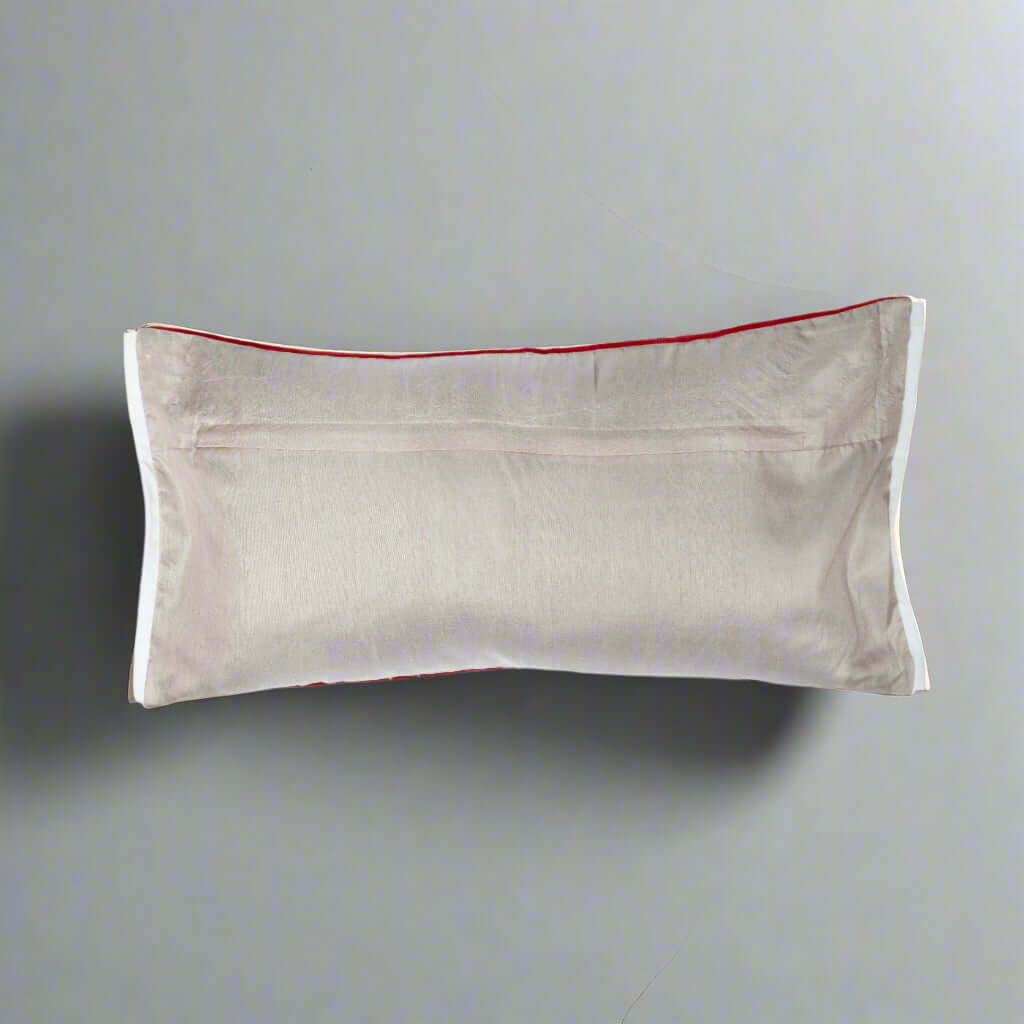 Beige pillowcase with red trim on a white background