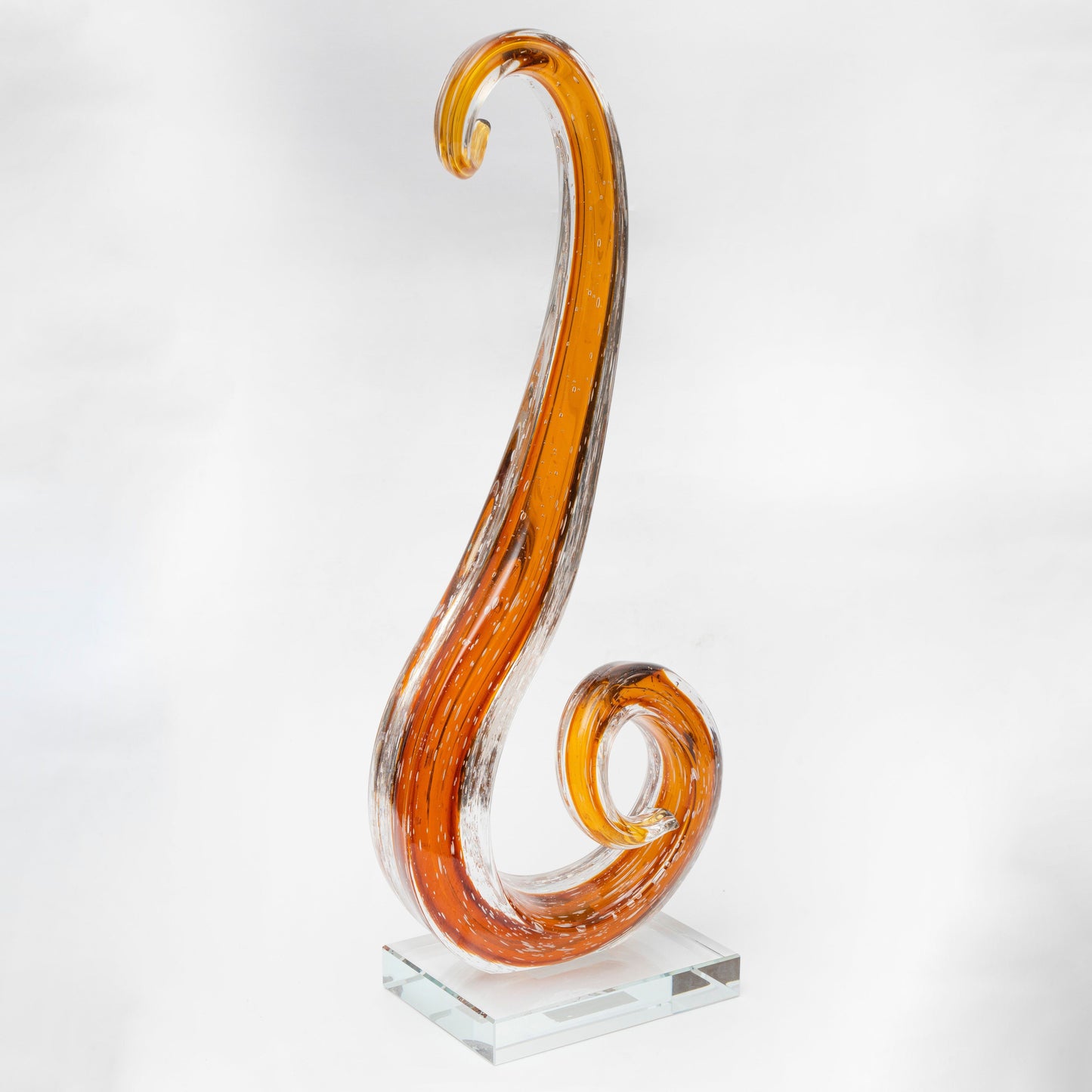 Golden Flow: Sculpted Amber Art Glass Swirl