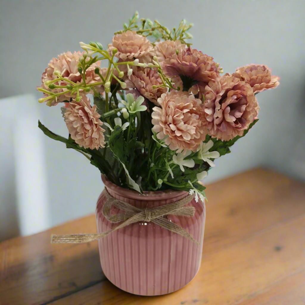 Rustic Charm: Artificial Blush Carnation Arrangement in Ceramic Ribbed Pink Pot