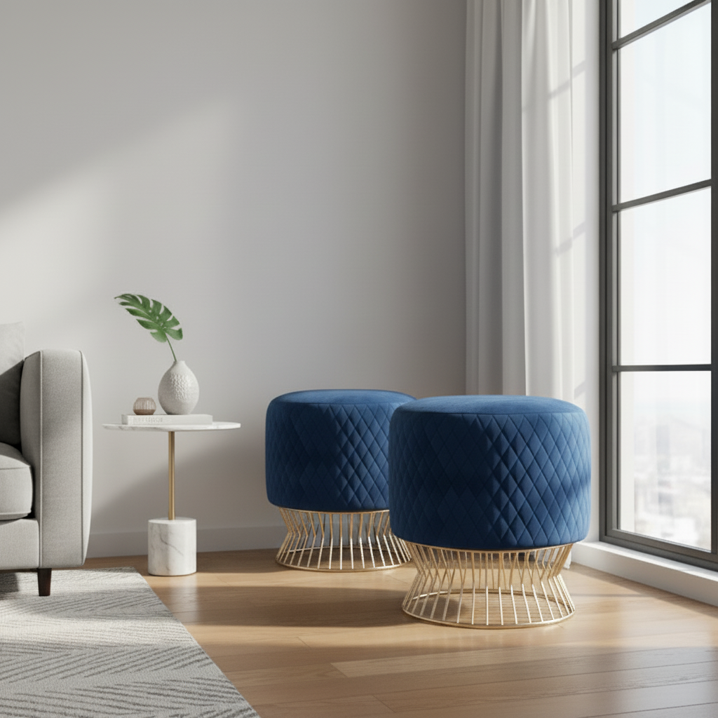 Two blue quilted stools with gold wire bases in a modern living room.