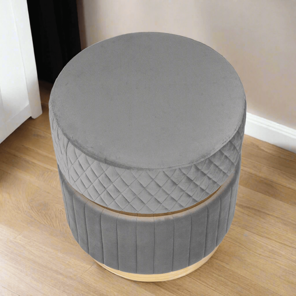 Chic Gray Two-Tiered Velvet Ottoman with diamond quilting and vertical channel tufting, adding elegant decor.