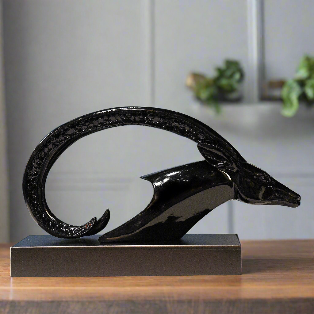 Midnight Horizon: Abstract Black Horned Sculpture