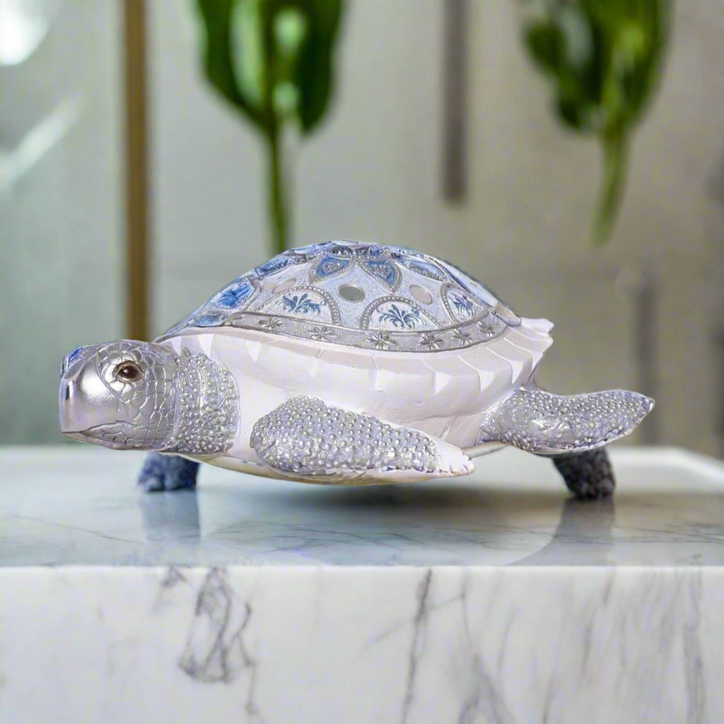 Oceanic Bloom: Embellished Silver & Blue Turtle Sculpture