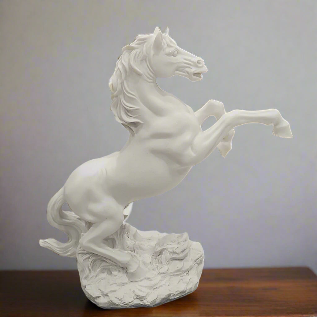White horse sculpture on a white background