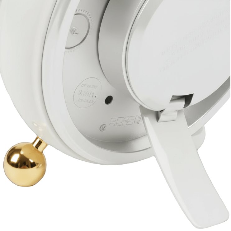 White electronic device with a gold spherical object on a white background