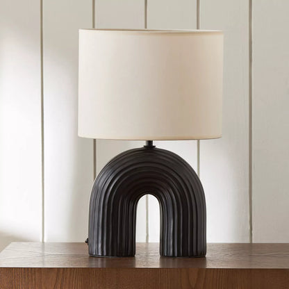 Modern Black Arch Ceramic Table Lamp with Ribbed Detail and Off-White Shade - 42 cm