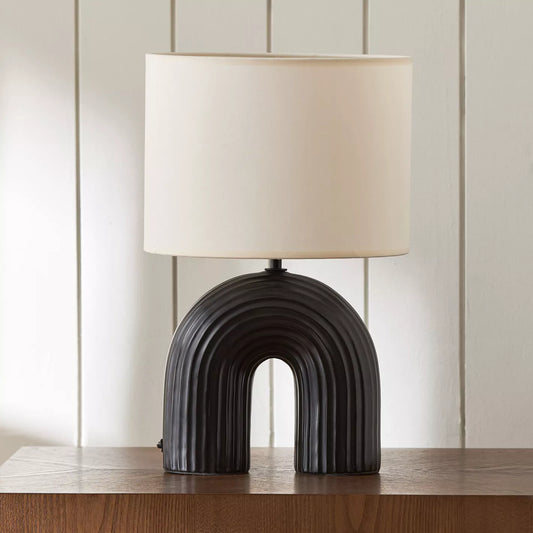 Modern Black Arch Ceramic Table Lamp with Ribbed Detail and Off-White Shade - 42 cm