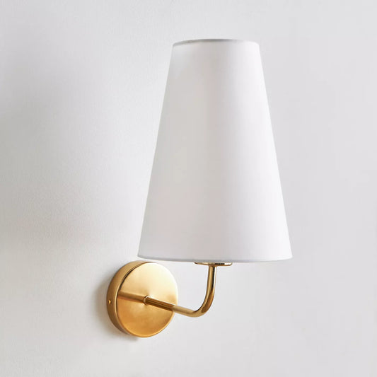 Elegant Gold Wall Sconce with Tapered White Fabric Shade