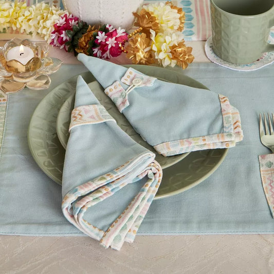 Pastel Geometric 4-Piece Solid Napkin with Printed Flange and Napkin Ring Set