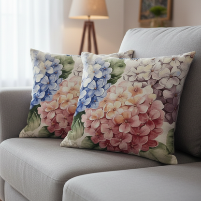 Floral-patterned cushions on a gray sofa in a living room setting.