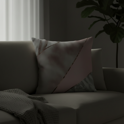 Sofa with decorative pillows and a blanket in a dimly lit room