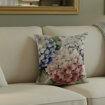 Floral-patterned pillow on a beige sofa with a mirror in the background
