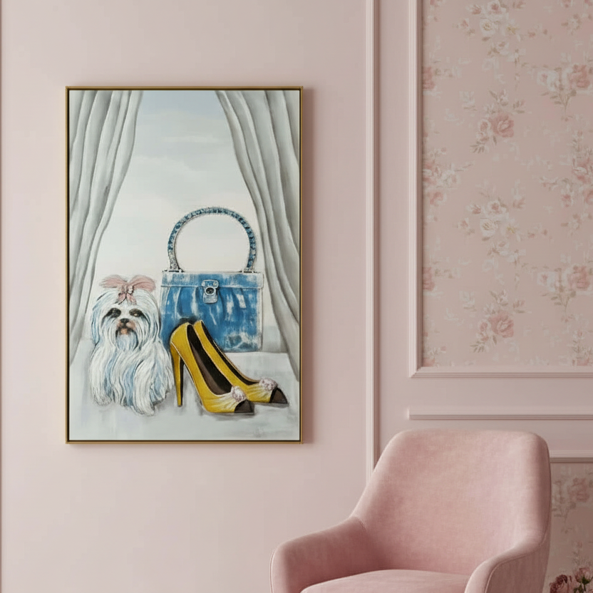 Framed artwork of a dog and high heels on a wall with floral wallpaper