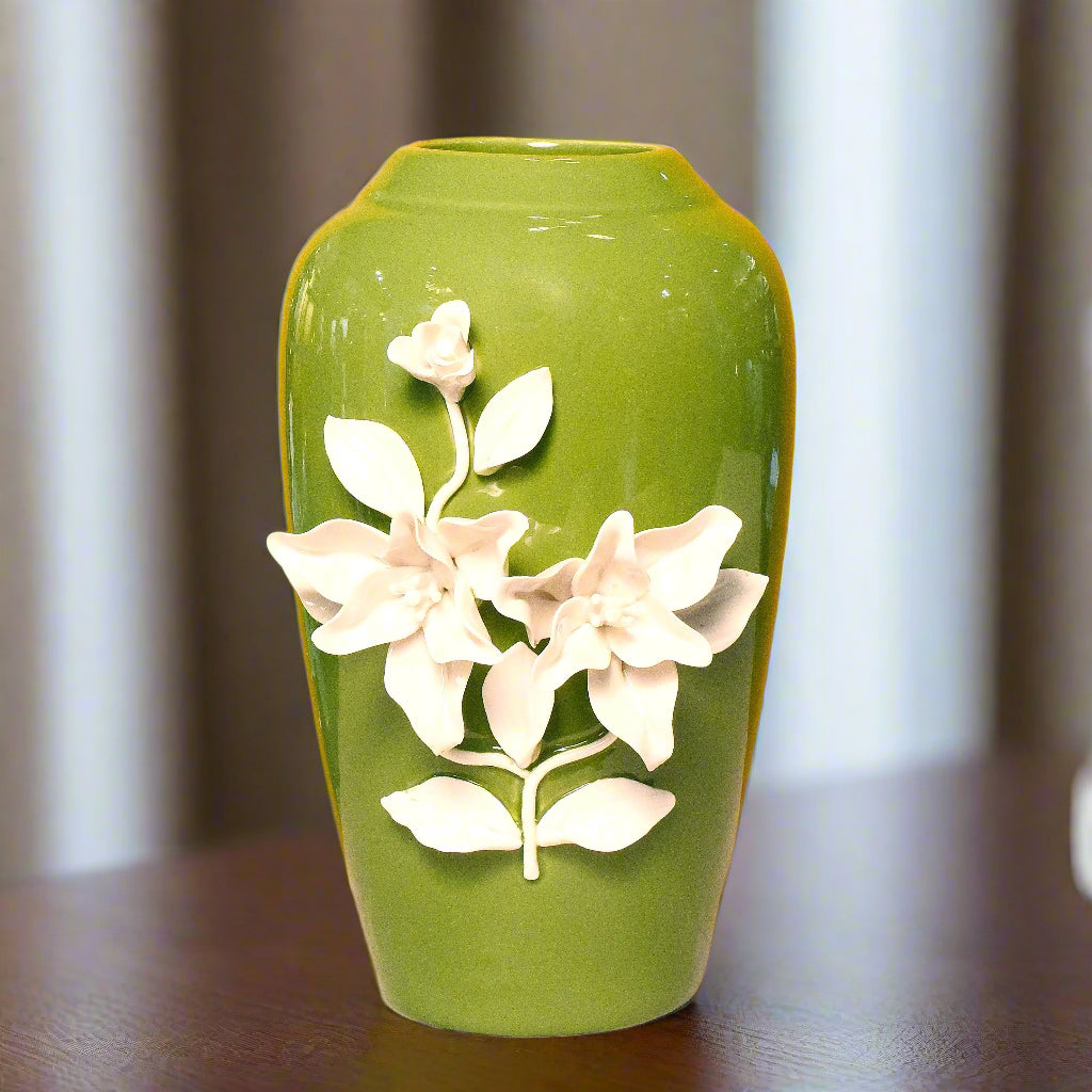 Verdant Elegance: Ceramic Vase with Sculpted White Blooms