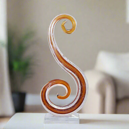 Golden Flow: Sculpted Amber Art Glass Swirl