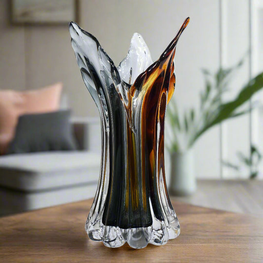 Glass vase with multicolored design on a white background