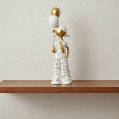 Golden Whimsy Variation: Spiraled Figurine with Celebration Balloons