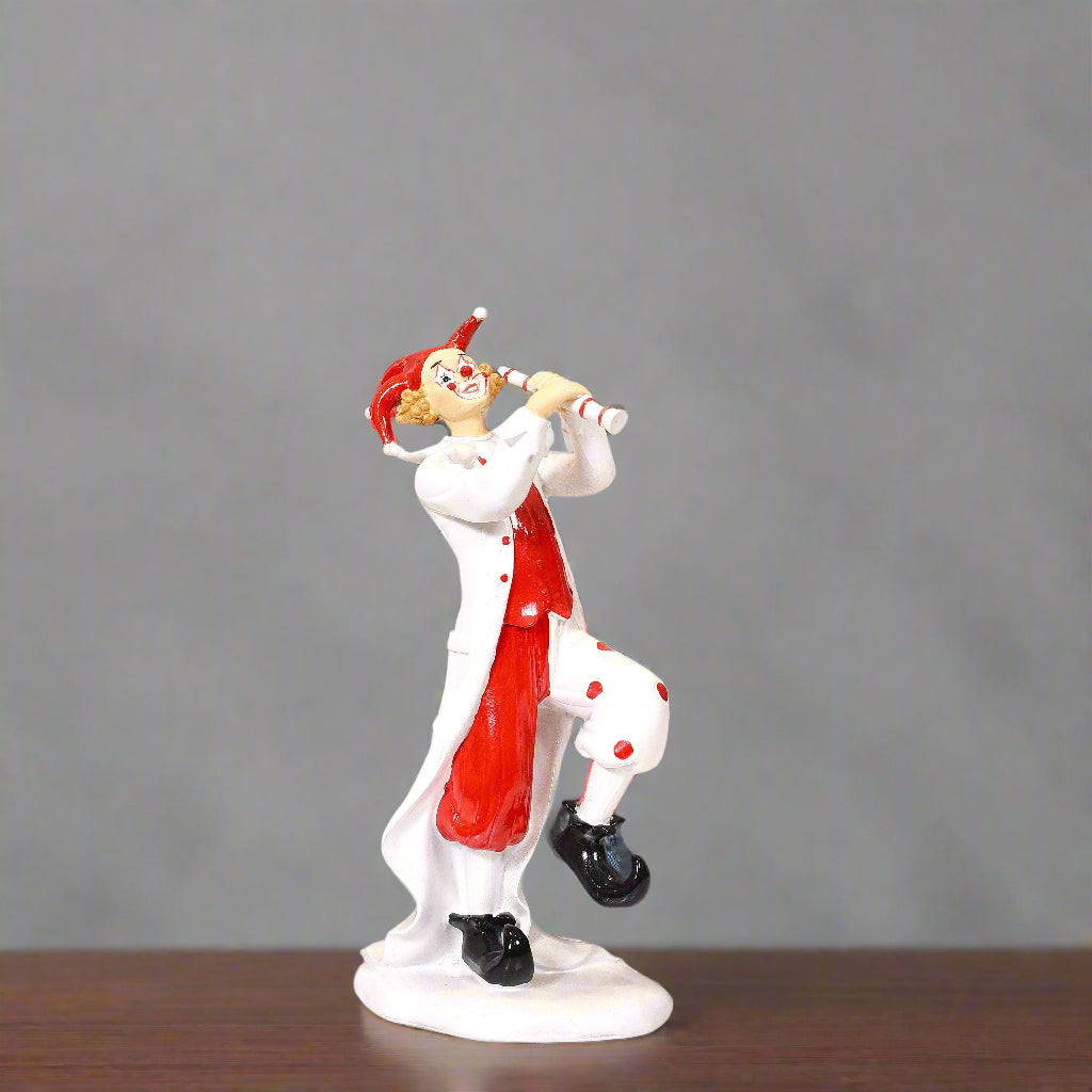 Melodic Mirth: Dynamic Clown Figurine with Flute