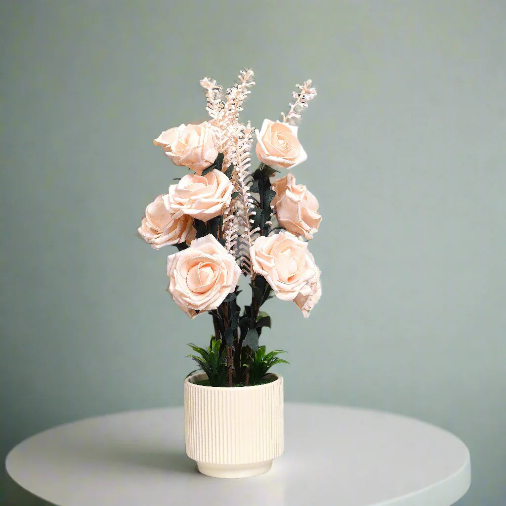 Soft Blush Serenity: Artificial Rose Arrangement in Ceramic Ribbed Pot