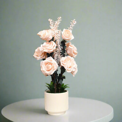 Soft Blush Serenity: Artificial Rose Arrangement in Ceramic Ribbed Pot