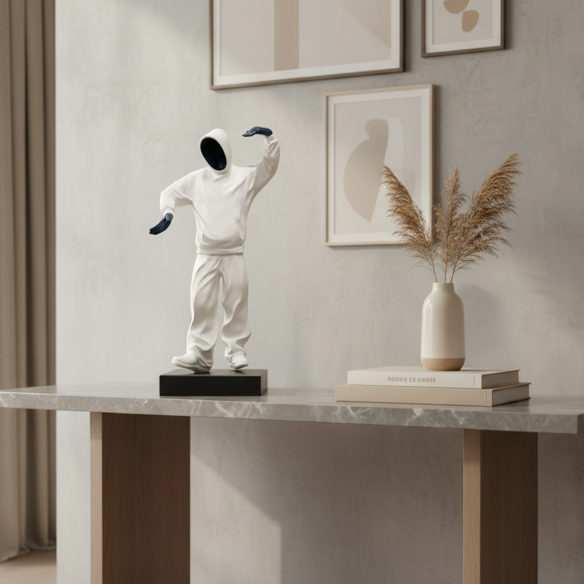 Decorative statue on a marble table with a neutral background