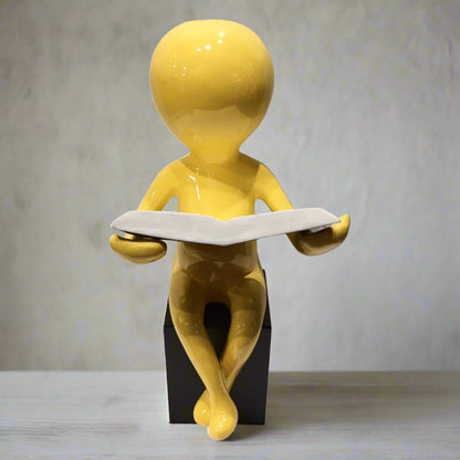 Golden Contemplation: Abstract Reading Figure Sculpture (Yellow)