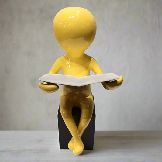 Golden Contemplation: Abstract Reading Figure Sculpture (Yellow)