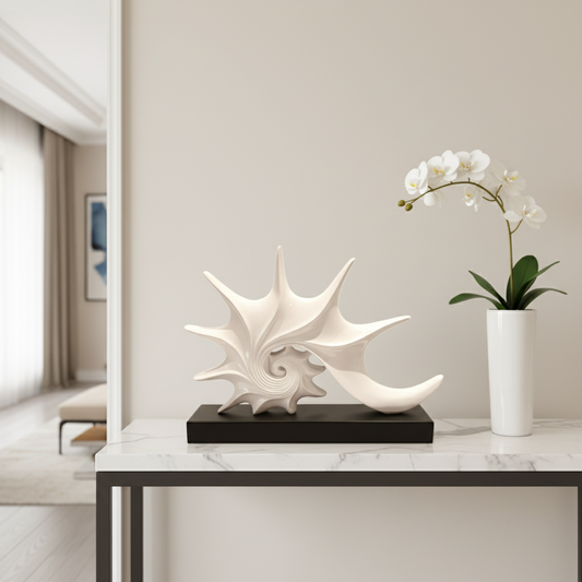 Decorative shell sculpture on a table with a vase of flowers in a room setting