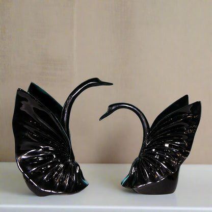 Graceful Embrace: Sculptural Black Swan Pair