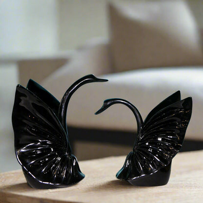 Graceful Embrace: Sculptural Black Swan Pair
