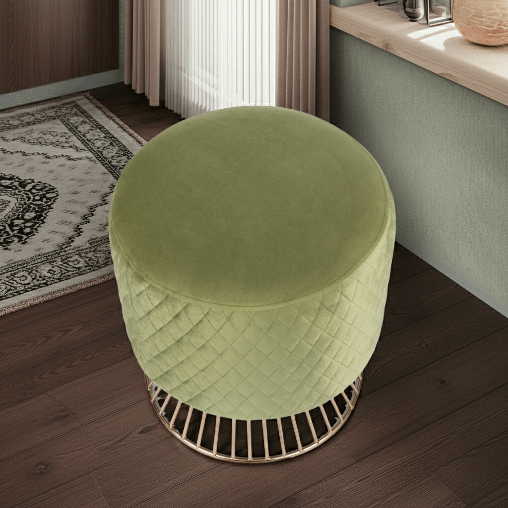 Green ottoman with woven pattern on a wooden floor