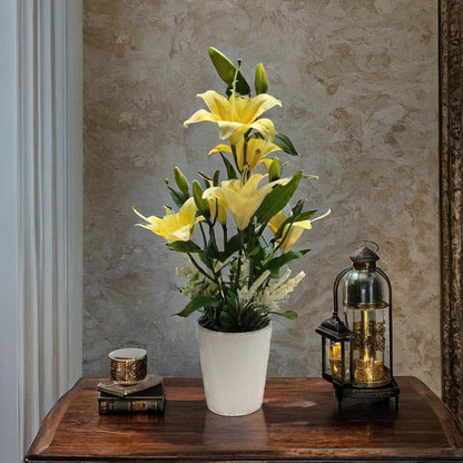 Sunny Splendor: Artificial Yellow Lily Arrangement in Ceramic Textured Pot
