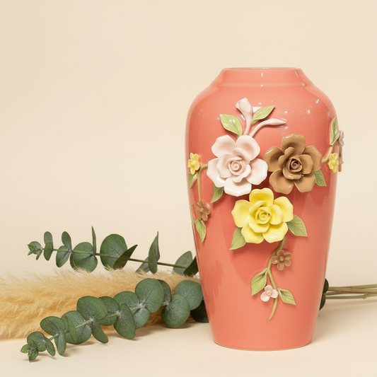 Coral-colored vase with floral decorations on a beige background