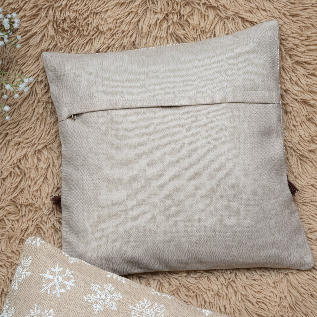 Beige pillow on a textured brown surface