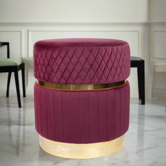 Purple ottoman with gold band on a white background