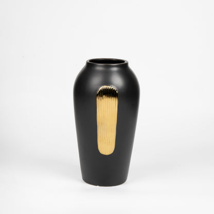 Black vase with a gold accent on a white background