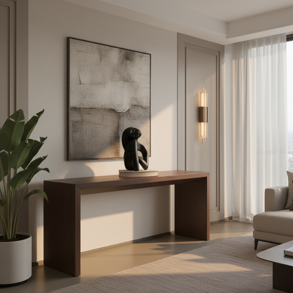 Modern interior with a wooden console table, abstract art, and a plant.