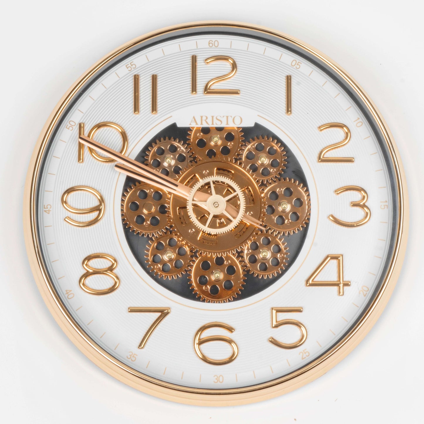 Decorative clock with gold gears and numbers on a white background
