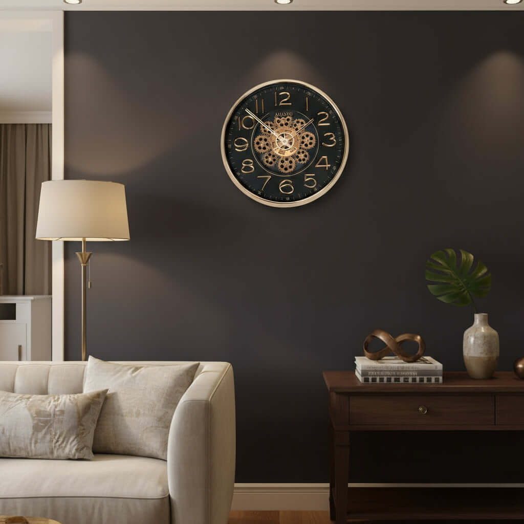 Decorative clock with visible gears on a black face and gold rim.
